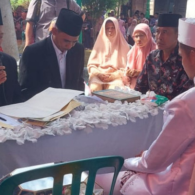 Plt  Kepala KUA Ulu Talo  Catat Nikah di Desa Tanjung Agung