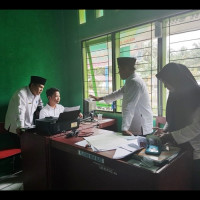 Kepala Kantor Kemenag MM Validasi SIMKAH KUA Kecamatan Air Dikit