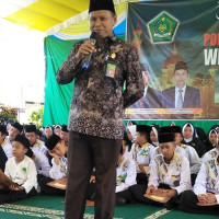 Hadiri Wisuda Tahfiz YMI, Kemenag BS Dorong Pembangunan Ponpes