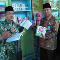 Kepala Kemenag BS Resmikan Pojok Perpustakaan MDTA Darussalam