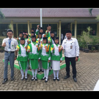 MTsN 1 BU Raih Juara I Lomba Paskibra HUT SMKN 2 BU