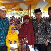 Kepala Kemenag BS Hadiri Penyerahan Manfaat Dana BAZNAS Kabupaten