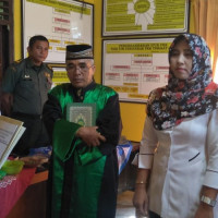 Kepala Kua Kec. Talang Empat Menjadi Menghadiri Pelantikan Perangkat Desa