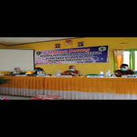 Sosialisasi Vaksinasi Covid-19, Ka.KUA Kec. Pematang Tiga Hadiri Pertemuan Lintas Sektor